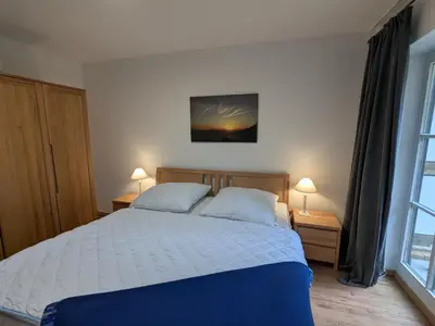 Ein Bett oder Betten in einem Zimmer der Unterkunft Rasmus