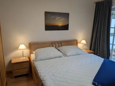 Ein Bett oder Betten in einem Zimmer der Unterkunft Rasmus