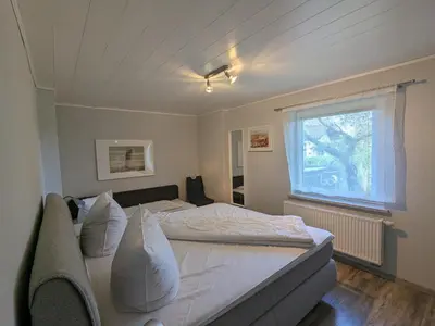 Ein Bett oder Betten in einem Zimmer der Unterkunft Nussbaum