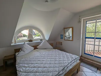 Ein Bett oder Betten in einem Zimmer der Unterkunft Nordstern