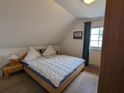 Ein Bett oder Betten in einem Zimmer der Unterkunft Morgensünn