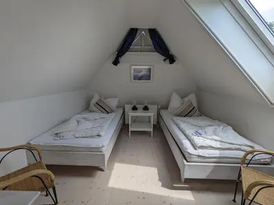Ein Bett oder Betten in einem Zimmer der Unterkunft Morgensünn