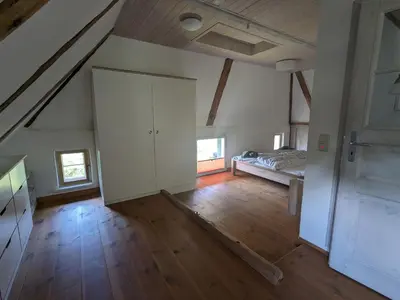 Ein Bett oder Betten in einem Zimmer der Unterkunft Das Darßhaus