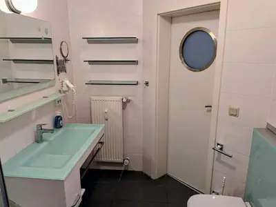 Ein Badezimmer in der Unterkunft Gute Stube Ahoi Darßkoje