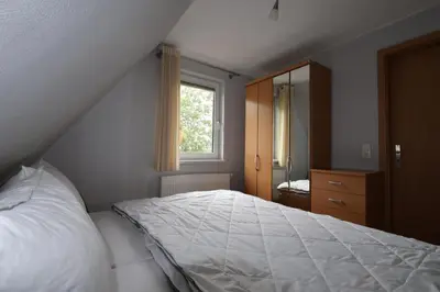 Ein Bett oder Betten in einem Zimmer der Unterkunft Kirschbaum