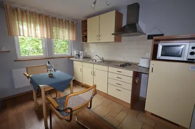 Küche/Küchenzeile in der Unterkunft Kirschbaum