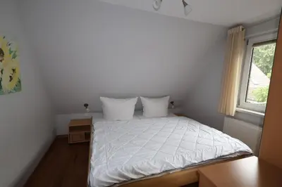 Ein Bett oder Betten in einem Zimmer der Unterkunft Kirschbaum