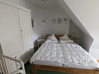 Ein Bett oder Betten in einem Zimmer der Unterkunft Inseltraum