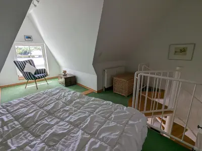 Ein Bett oder Betten in einem Zimmer der Unterkunft Inseltraum