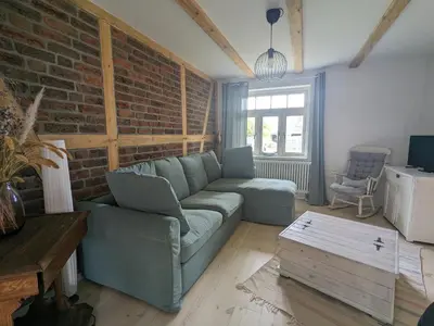 Ein Sitzbereich in der Unterkunft Eichenlund