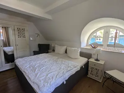 Ein Bett oder Betten in einem Zimmer der Unterkunft Haus Meer