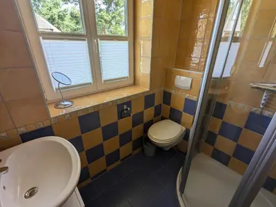 Ein Badezimmer in der Unterkunft Haus Meer