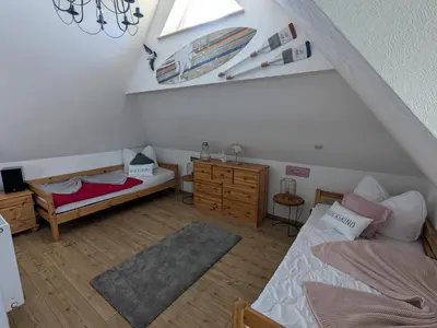 Ein Bett oder Betten in einem Zimmer der Unterkunft Haus Sonne