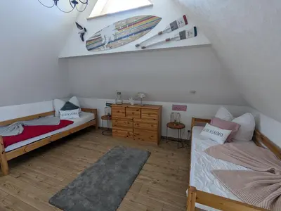Ein Bett oder Betten in einem Zimmer der Unterkunft Haus Sonne