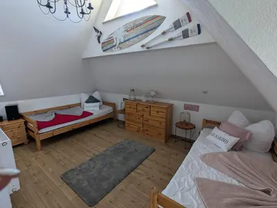 Ein Bett oder Betten in einem Zimmer der Unterkunft Haus Sonne