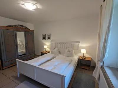 Ein Bett oder Betten in einem Zimmer der Unterkunft Holl Dörch