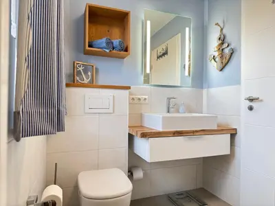 Ein Badezimmer in der Unterkunft Haus Windflüchter