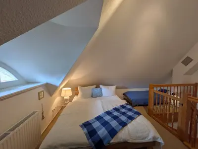 Ein Bett oder Betten in einem Zimmer der Unterkunft Haus Wikinger
