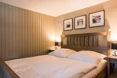 Ein Bett oder Betten in einem Zimmer der Unterkunft Fischers Stübchen