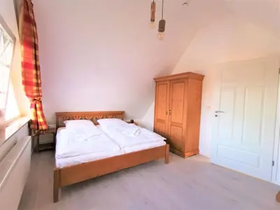 Ein Bett oder Betten in einem Zimmer der Unterkunft Sola Bona Wohnung 7