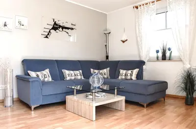 Ein Sitzbereich in der Unterkunft Fritz-Reuter-Straße 4 Wohnung de Strandläufer