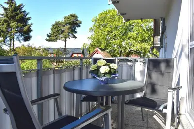 Ein Balkon oder eine Terrasse in der Unterkunft Fritz-Reuter-Straße 4 Wohnung de Strandläufer