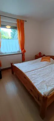Ein Bett oder Betten in einem Zimmer der Unterkunft Ferienhaus 2 Bernd