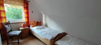 Ein Bett oder Betten in einem Zimmer der Unterkunft Ferienhaus 2 Bernd