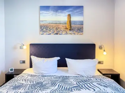 Ein Bett oder Betten in einem Zimmer der Unterkunft Meerle 3