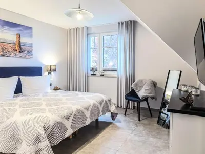 Ein Bett oder Betten in einem Zimmer der Unterkunft Meerle 5
