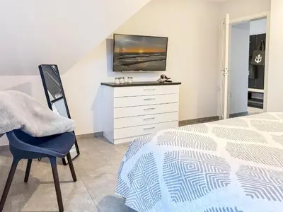 Ein Bett oder Betten in einem Zimmer der Unterkunft Meerle 5