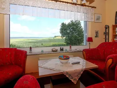 Ein Sitzbereich in der Unterkunft Ferienhaus am Schilfufer in Barth