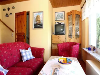 Ein Sitzbereich in der Unterkunft Ferienhaus am Schilfufer in Barth