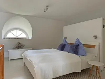 Ein Bett oder Betten in einem Zimmer der Unterkunft Achtern Diek Haus 11 Wohnung 7 