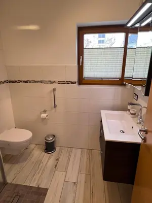 Ein Badezimmer in der Unterkunft Ostseeperle Zingst, strandnahes 3-Zimmer Apartment