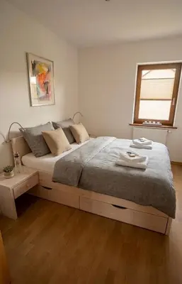 Ein Bett oder Betten in einem Zimmer der Unterkunft Ostseeperle Zingst, strandnahes 3-Zimmer Apartment