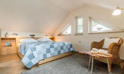 Ein Bett oder Betten in einem Zimmer der Unterkunft Wellenzauber