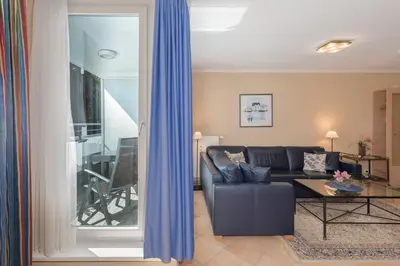 Ein Sitzbereich in der Unterkunft Apartment an der Seebrücke