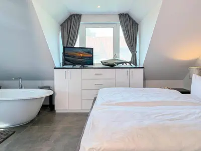 Ein Bett oder Betten in einem Zimmer der Unterkunft Charlotte