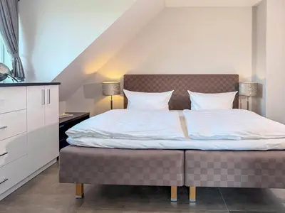 Ein Bett oder Betten in einem Zimmer der Unterkunft Charlotte