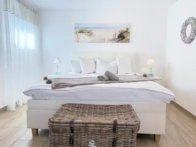 Ein Bett oder Betten in einem Zimmer der Unterkunft Strandkaten