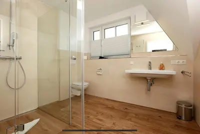 Ein Badezimmer in der Unterkunft Haus Eichkater