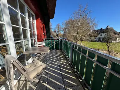 Ein Balkon oder eine Terrasse in der Unterkunft Ferienhaus Chausseestraße App 02