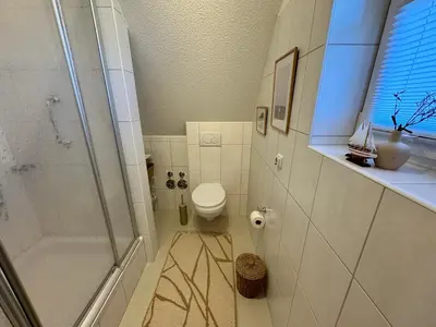 Ein Badezimmer in der Unterkunft Ferienhaus Chausseestraße App 02