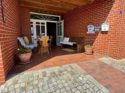 Ein Patio oder anderer Außenbereich in der Unterkunft FERIENWOHNUNGEN Krull App 02