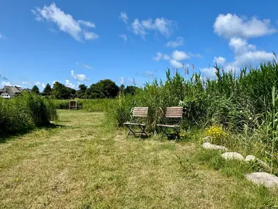 Ein Garten an der Unterkunft FERIENWOHNUNGEN Krull App 02