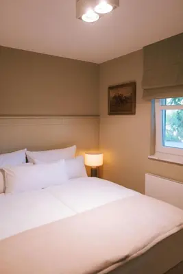 Ein Bett oder Betten in einem Zimmer der Unterkunft Sünn un See - Hortensienblick