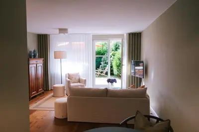 Ein Sitzbereich in der Unterkunft Sünn un See - Hortensienblick