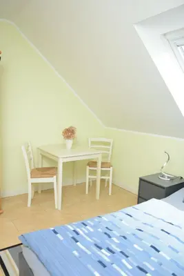Ein Bett oder Betten in einem Zimmer der Unterkunft Min Hüsken