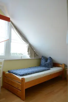 Ein Bett oder Betten in einem Zimmer der Unterkunft Min Hüsken